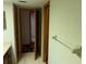 Well-lit bathroom area showcasing the vanity with a tiled floor at 10 Woodridge Cir, Oldsmar, FL 34677