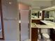 Bathroom with double sinks, shower, and toilet at 10 Woodridge Cir, Oldsmar, FL 34677
