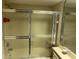 Bathroom with shower and vanity at 10 Woodridge Cir, Oldsmar, FL 34677