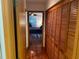 This bedroom leads to a closet and the rest of the house at 10 Woodridge Cir, Oldsmar, FL 34677