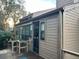 Exterior view of the home showcasing a lovely deck at 10 Woodridge Cir, Oldsmar, FL 34677
