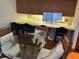 Kitchen with breakfast bar and access to dining area at 10 Woodridge Cir, Oldsmar, FL 34677