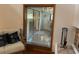 Comfortable living room with a glass sliding doors and natural lighting at 10 Woodridge Cir, Oldsmar, FL 34677