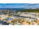 Aerial view of waterfront home with canal access and a view of the ocean at 1009 Spindle Palm Way, Apollo Beach, FL 33572