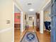 Welcoming entryway with hardwood floors, an area rug, and decorative accents at 10114 Lindelaan Dr, Tampa, FL 33618