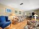 Cozy living room with comfortable furniture and a piano at 10114 Lindelaan Dr, Tampa, FL 33618