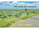 Scenic aerial view showcases the home's proximity to R.E. Olds Park, Safety Harbor, and a public pier at 102 Shore E Dr, Oldsmar, FL 34677