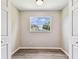 Bedroom with wood look flooring and a window view at 102 Shore E Dr, Oldsmar, FL 34677