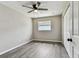 Bedroom with closet, and wood look flooring at 102 Shore E Dr, Oldsmar, FL 34677