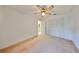 Bedroom with ceiling fan and double door closet at 11332 Torrey Pines Dr, Riverview, FL 33579