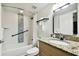 Clean bathroom, granite countertop, shower, and bathtub at 11605 Gulf Blvd # 502, Treasure Island, FL 33706
