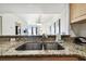 Kitchen sink and granite countertop at 11605 Gulf Blvd # 502, Treasure Island, FL 33706