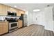 Modern kitchen with stainless steel appliances at 11605 Gulf Blvd # 502, Treasure Island, FL 33706