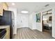 Modern kitchen with stainless steel appliances and entryway at 11605 Gulf Blvd # 502, Treasure Island, FL 33706