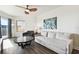 Living room with ocean view and a sleeper sofa at 11605 Gulf Blvd # 502, Treasure Island, FL 33706