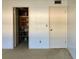 Hallway with closet and door with access to storage at 1235 S Highland Ave # 2-206, Clearwater, FL 33756