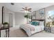 Main bedroom with plush carpeting and large windows at 13222 Pike Lake Dr, Riverview, FL 33579