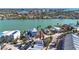 High-angle view of a waterfront home in a residential area at 313 Bay Plz, Treasure Island, FL 33706