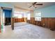 Open-concept living area mid-renovation with exposed framing and tile flooring at 313 Bay Plz, Treasure Island, FL 33706