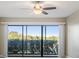 Living area with sliding doors and backyard view at 3200 Cove Cay Dr # 1E, Clearwater, FL 33760