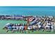 Aerial view of a waterfront home in a residential neighborhood at 333 Bay Plz, Treasure Island, FL 33706