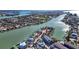 High-angle view emphasizing waterfront location with nearby docks at 333 Bay Plz, Treasure Island, FL 33706