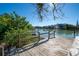 Empty wooden dock extending into the water at 333 Bay Plz, Treasure Island, FL 33706