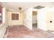 Interior view of a room with yellow walls and a boarded-up window at 333 Bay Plz, Treasure Island, FL 33706
