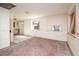 Empty kitchen with window ac unit and doorway to another room at 333 Bay Plz, Treasure Island, FL 33706