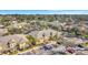 Aerial view of community featuring multiple buildings, landscaping, and parking at 3870 Island Way, St Petersburg, FL 33705