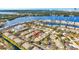 Wide aerial view of community, highlighting a building near waterfront at 3870 Island Way, St Petersburg, FL 33705