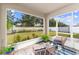 Relaxing screened porch overlooking the backyard at 5558 Angelonia Ter, Land O Lakes, FL 34639