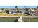 Single-story home with private dock and waterfront view at 568 Johns Pass Ave, Madeira Beach, FL 33708