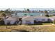 Single-story home with waterfront view, needs roof repair at 568 Johns Pass Ave, Madeira Beach, FL 33708