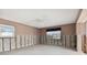 Room with window and ceiling fan, ready for remodel at 568 Johns Pass Ave, Madeira Beach, FL 33708