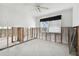 Unfinished bedroom with exposed framing and window at 568 Johns Pass Ave, Madeira Beach, FL 33708