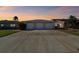 Three-car garage with a spacious driveway at 568 Johns Pass Ave, Madeira Beach, FL 33708
