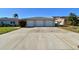 Three-car garage with a spacious driveway at 568 Johns Pass Ave, Madeira Beach, FL 33708