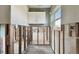 Damaged kitchen area needing complete renovation. Upper cabinets are present at 568 Johns Pass Ave, Madeira Beach, FL 33708