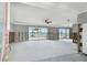 Large living room undergoing renovations with water views at 568 Johns Pass Ave, Madeira Beach, FL 33708