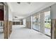 Living room with water damage and exposed framing, ideal for remodeling at 568 Johns Pass Ave, Madeira Beach, FL 33708