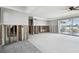 Living room with extensive damage, ready for renovations at 568 Johns Pass Ave, Madeira Beach, FL 33708