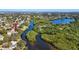 High-angle shot of the property near a river, highlighting its proximity to nature at 8385 81St St, Seminole, FL 33777