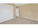 Bedroom with double door closet and carpet at 9229 Overlook Dr, Temple Terrace, FL 33617