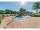 Community hot tub with surrounding patio furniture at 12000 Gulf Blvd # 212-N, Treasure Island, FL 33706