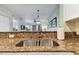 Well-appointed kitchen with stainless steel sink and granite countertop at 12000 Gulf Blvd # 212-N, Treasure Island, FL 33706