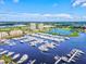Aerial view of luxury community with marina and resort amenities at 140 Riviera Dunes Way # 1001, Palmetto, FL 34221