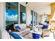 Relaxing balcony with comfortable seating and stunning views at 140 Riviera Dunes Way # 1001, Palmetto, FL 34221