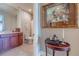 Elegant bathroom with a toilet and a vanity at 140 Riviera Dunes Way # 1001, Palmetto, FL 34221