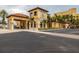 Community building with a Mediterranean style and ample parking at 140 Riviera Dunes Way # 1001, Palmetto, FL 34221